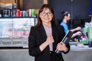 Portrait of business woman, accountant, lawyer, coffee shop cafeteria restaurant owner